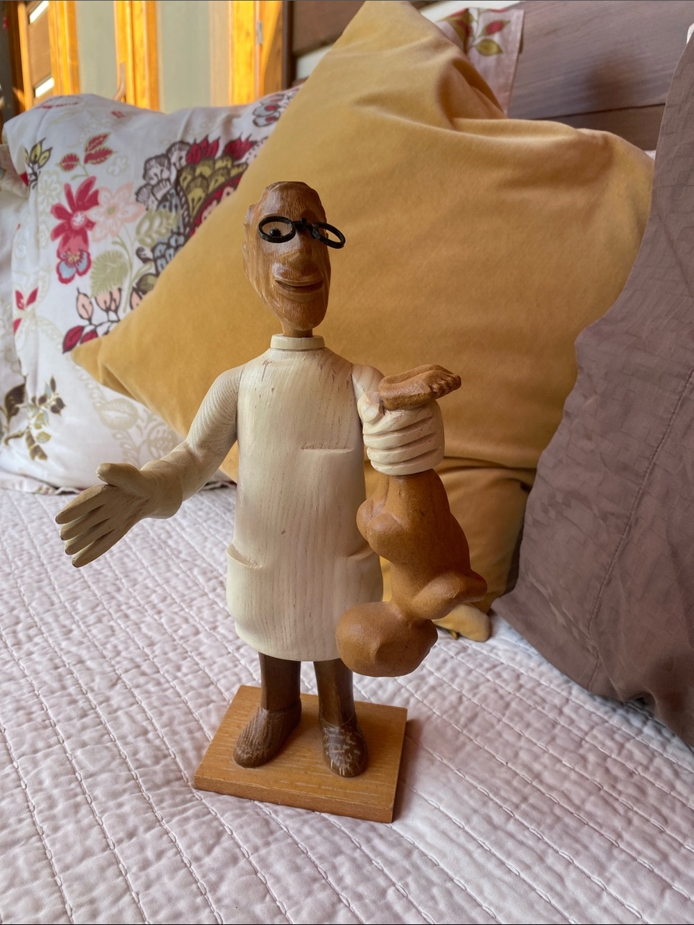 Hand-Carved Wooden Figurine - Neutral Tones